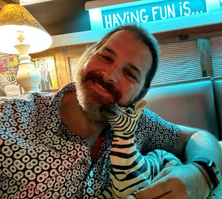 Rick Subel with giraffe